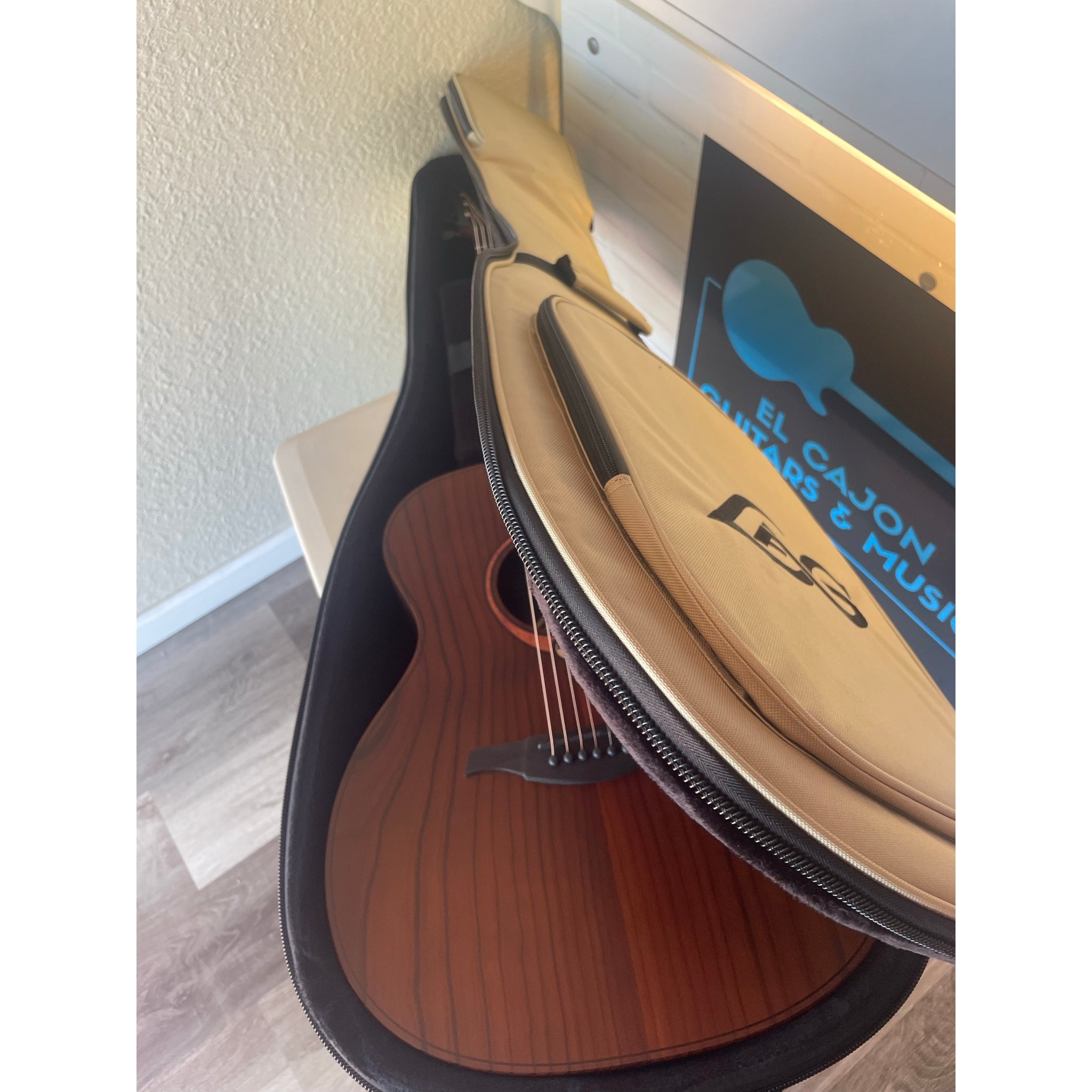 This guitar in its case, the Lâg Sauvage-A Auditorium Acoustic Guitar with Serial 2511LT20951 