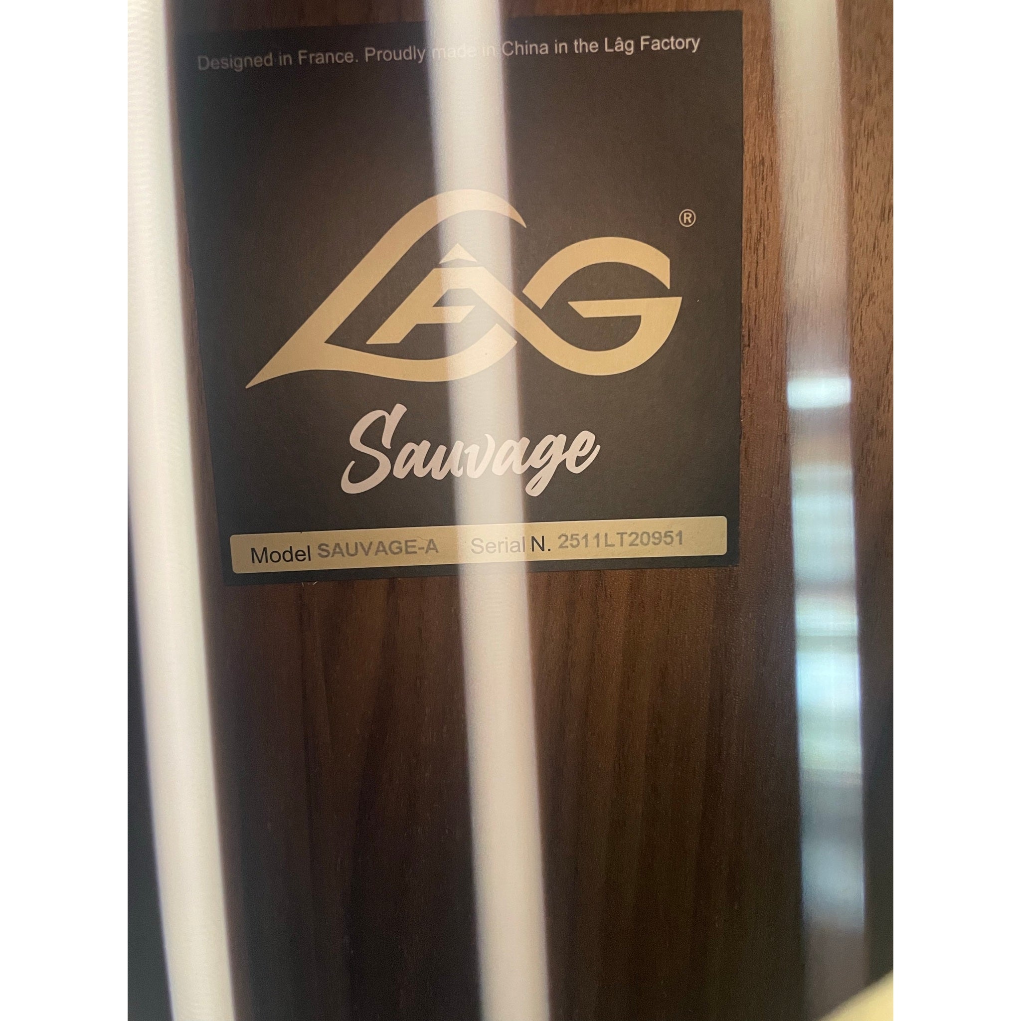Photo of interior sound hole of this Acoustic Guitar with Serial 2511LT20951 showing.