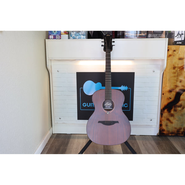This Lâg Sauvage-A Auditorium Acoustic Guitar with Serial 2511LT20951, in a stand at front of El Cajon Guitars & Music.