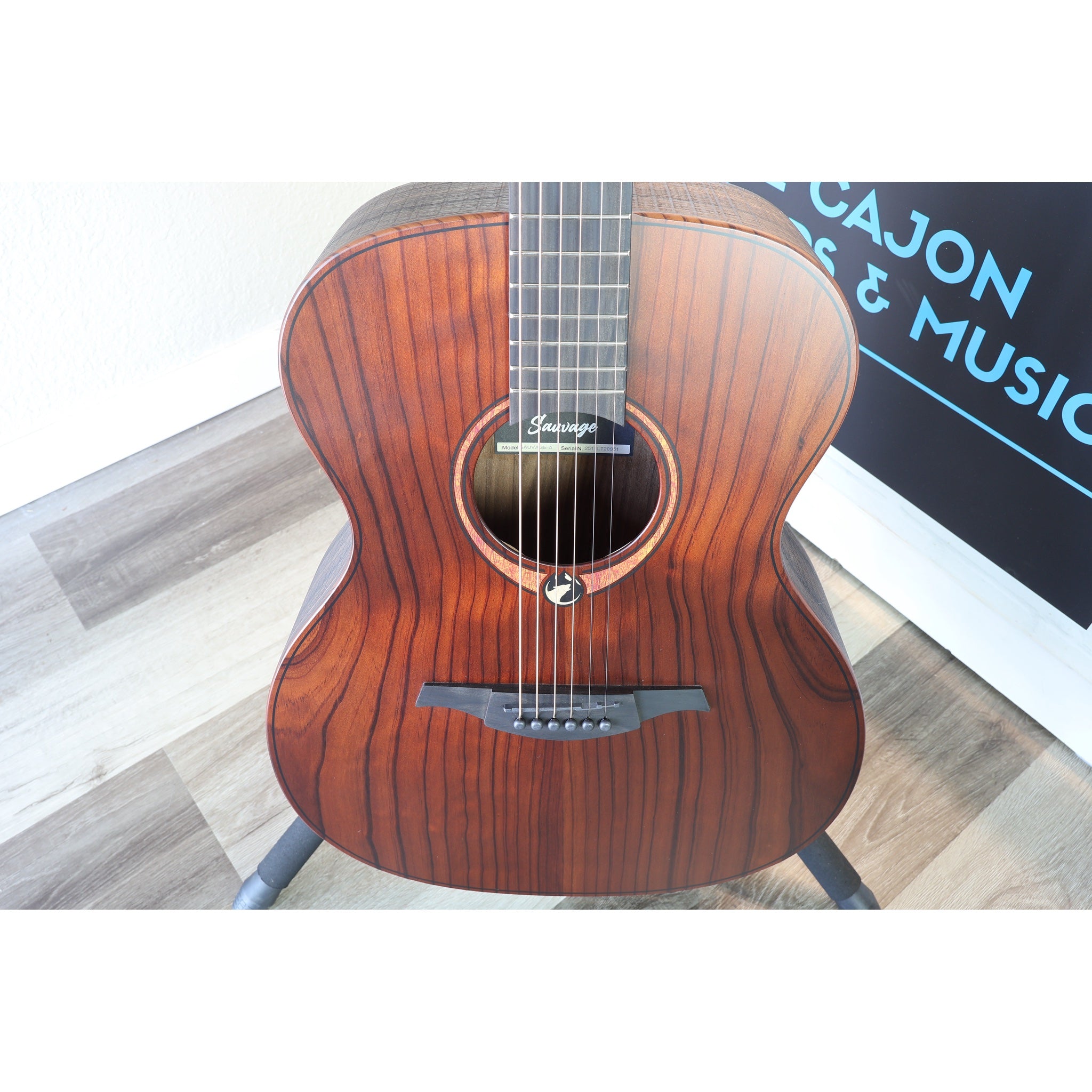 The front of the guitar body from a slightly downward angle with the grain of the top showing nicely on 2511LT20951.