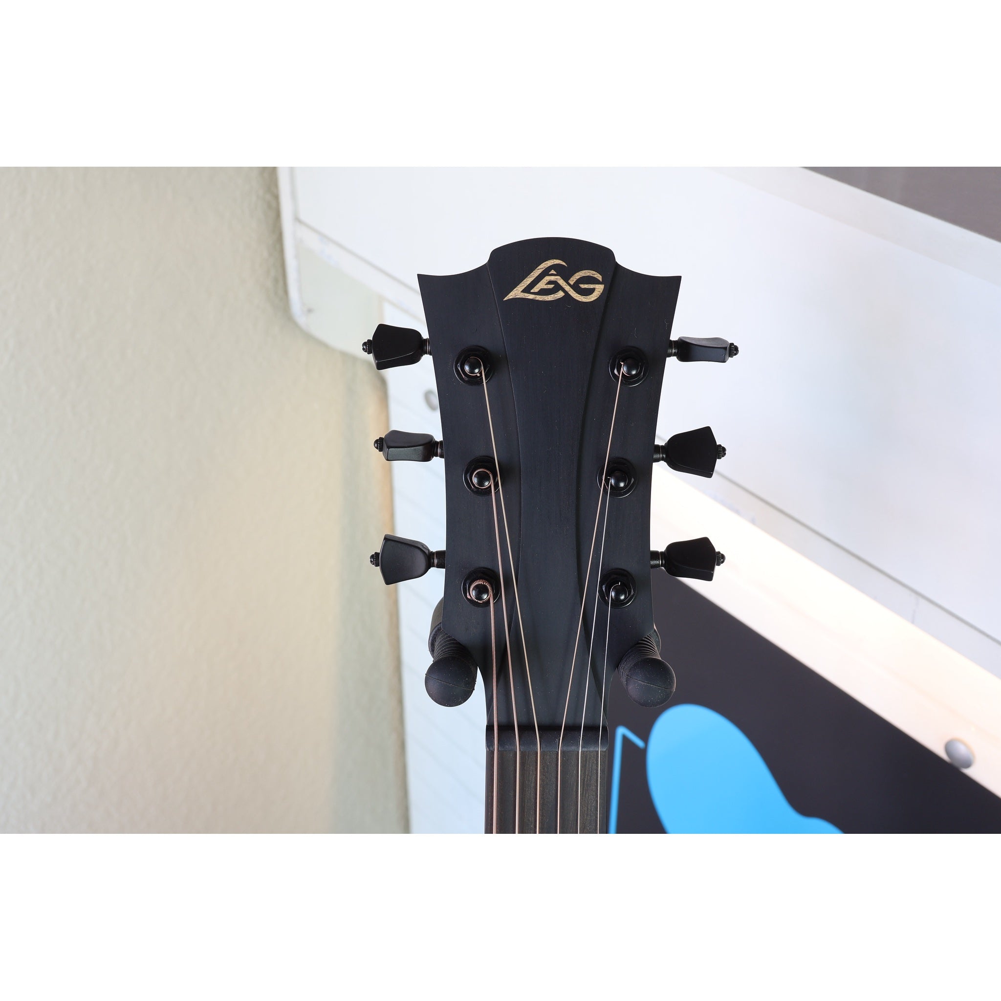 Headstock of this guitar a Lâg Sauvage-A Auditorium Acoustic Guitar with Serial 2511LT20951 