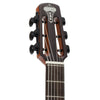 Close-up of the headstock of Lâg SL100 Petite Bouche Gypsy Jazz acoustic guitar, showing the brand logo and six black tuning pegs against a white background.