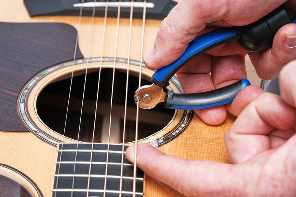 (NEW) GRIP ONE - All in ONE String Winder Cutter Puller - El Cajon Guitars and Music