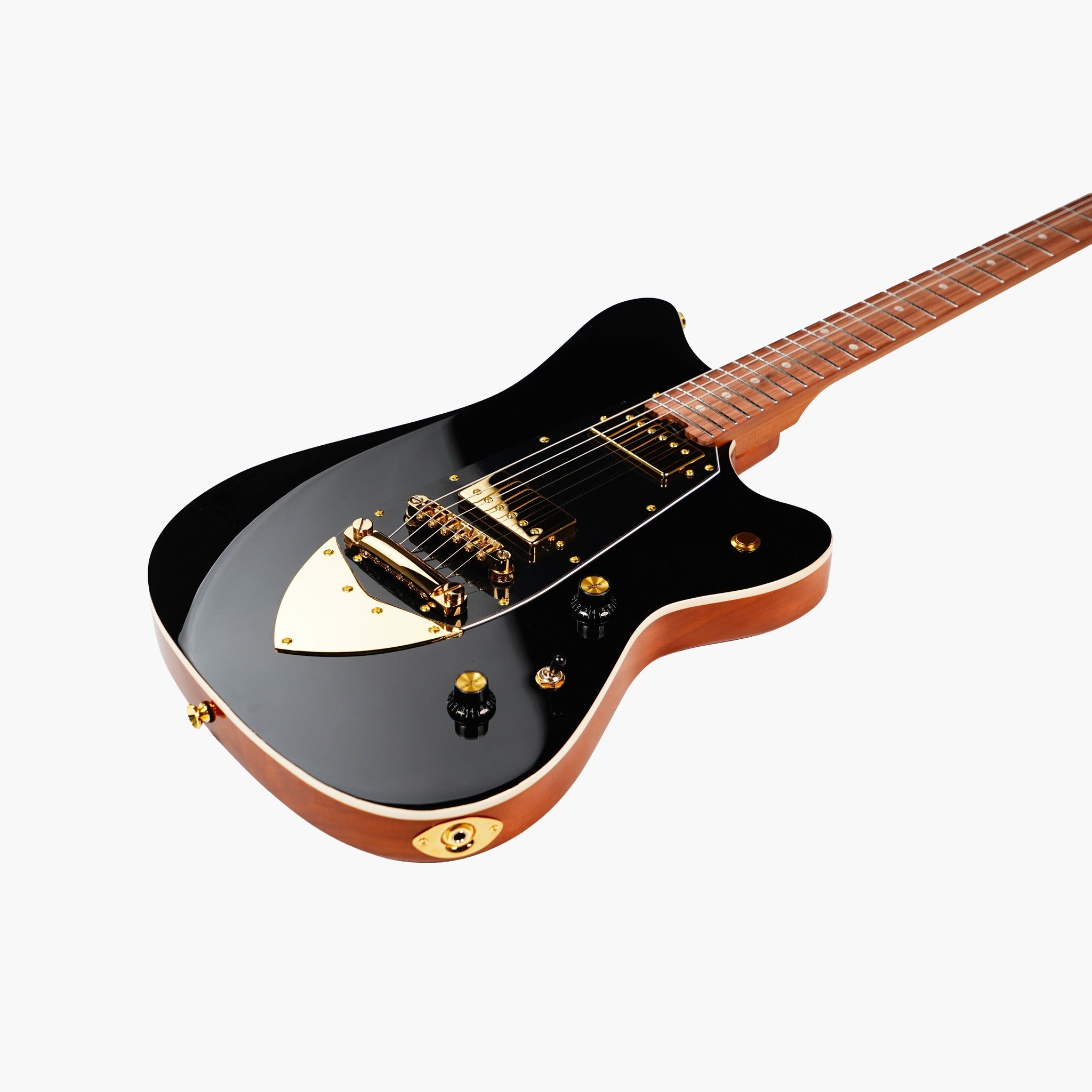 Tagima Rocker UQ black body angle showing gold humbuckers and bridge