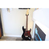 Tagima T-635 Classic Black Electric Guitar with Lace Sensor Pickups in a stand at El Cajon Guitars & Music.