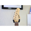 Headstock front on the Tagima T-635 Classic Black Electric Guitar with Lace Sensor Red/Silver/Blue Pickups.