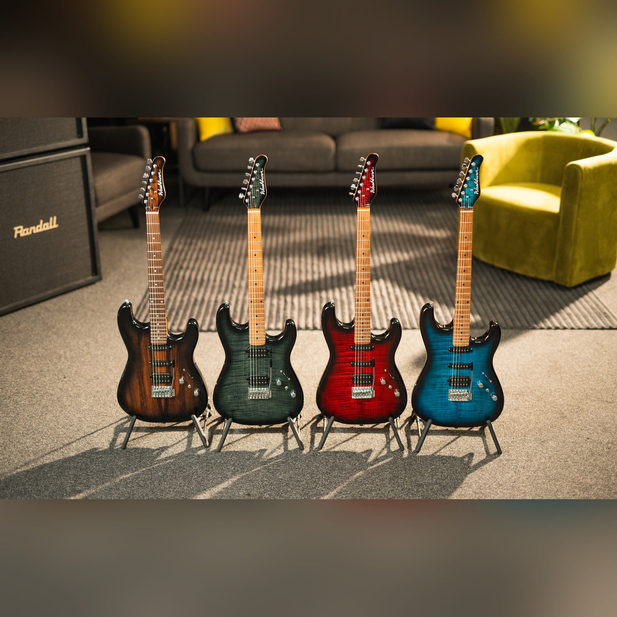 Washburn Sonamaster Elite series lineup: Striped Ebony, Flame Black Burst, Flame Red Burst and Flame Blue Burst